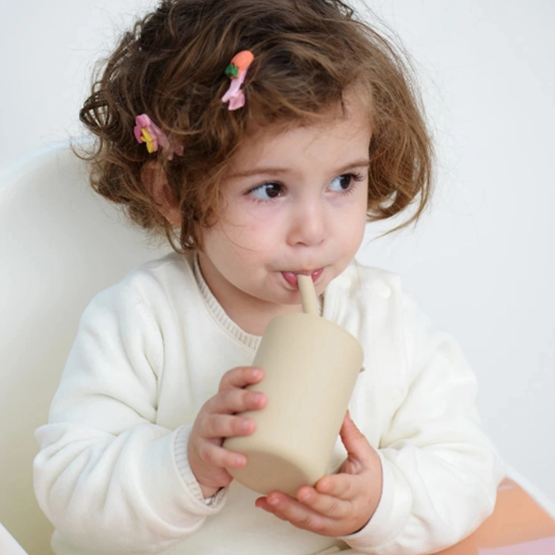 Child water cup with silicone bottom